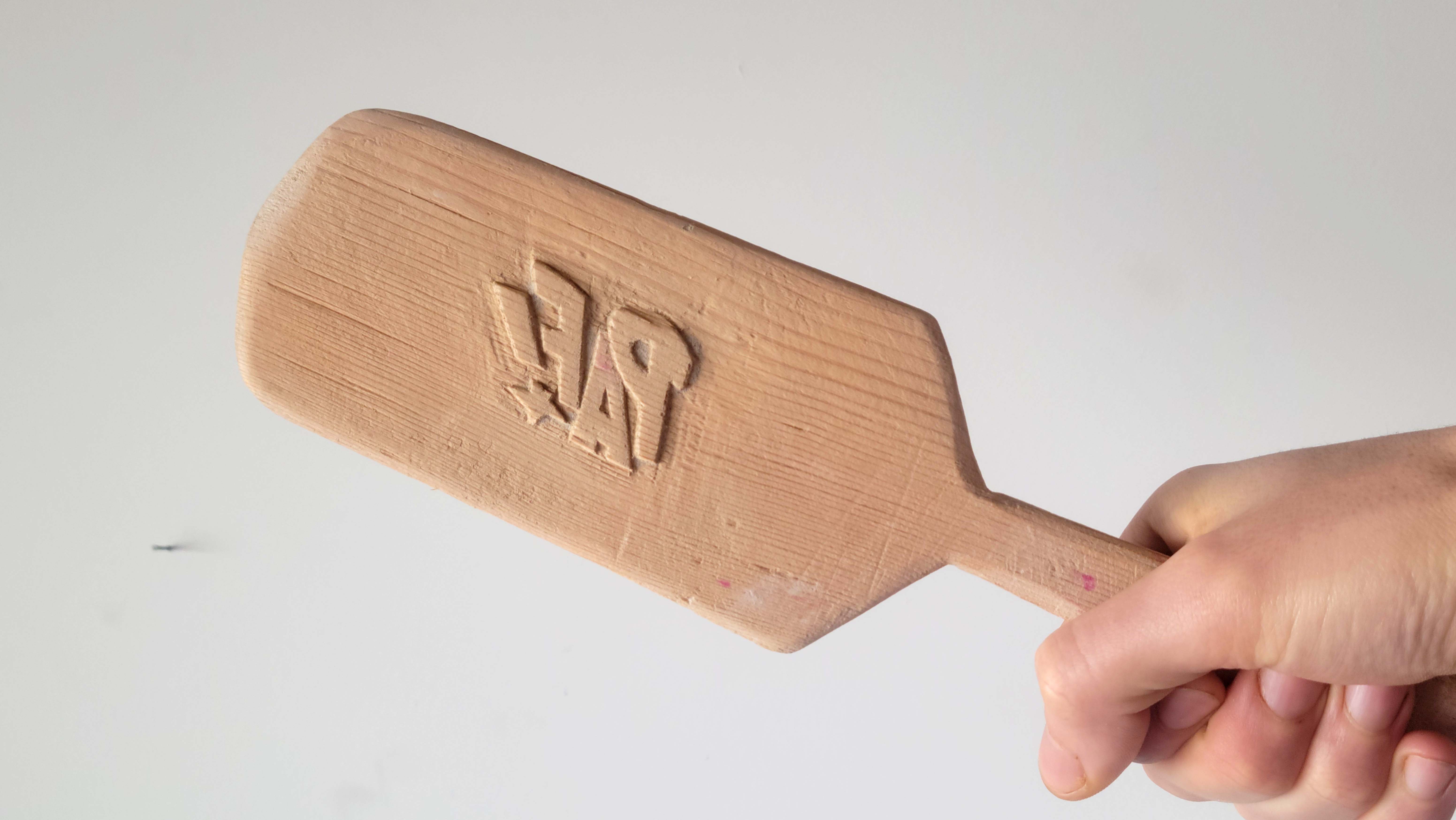 Paddle with 'PAF!' incised on it